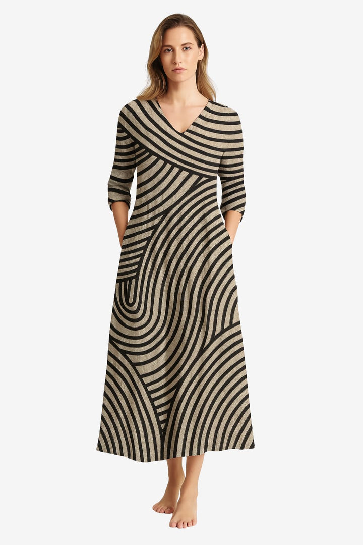 Long women's dress with a V-neck, 3/4 sleeves, loose fit